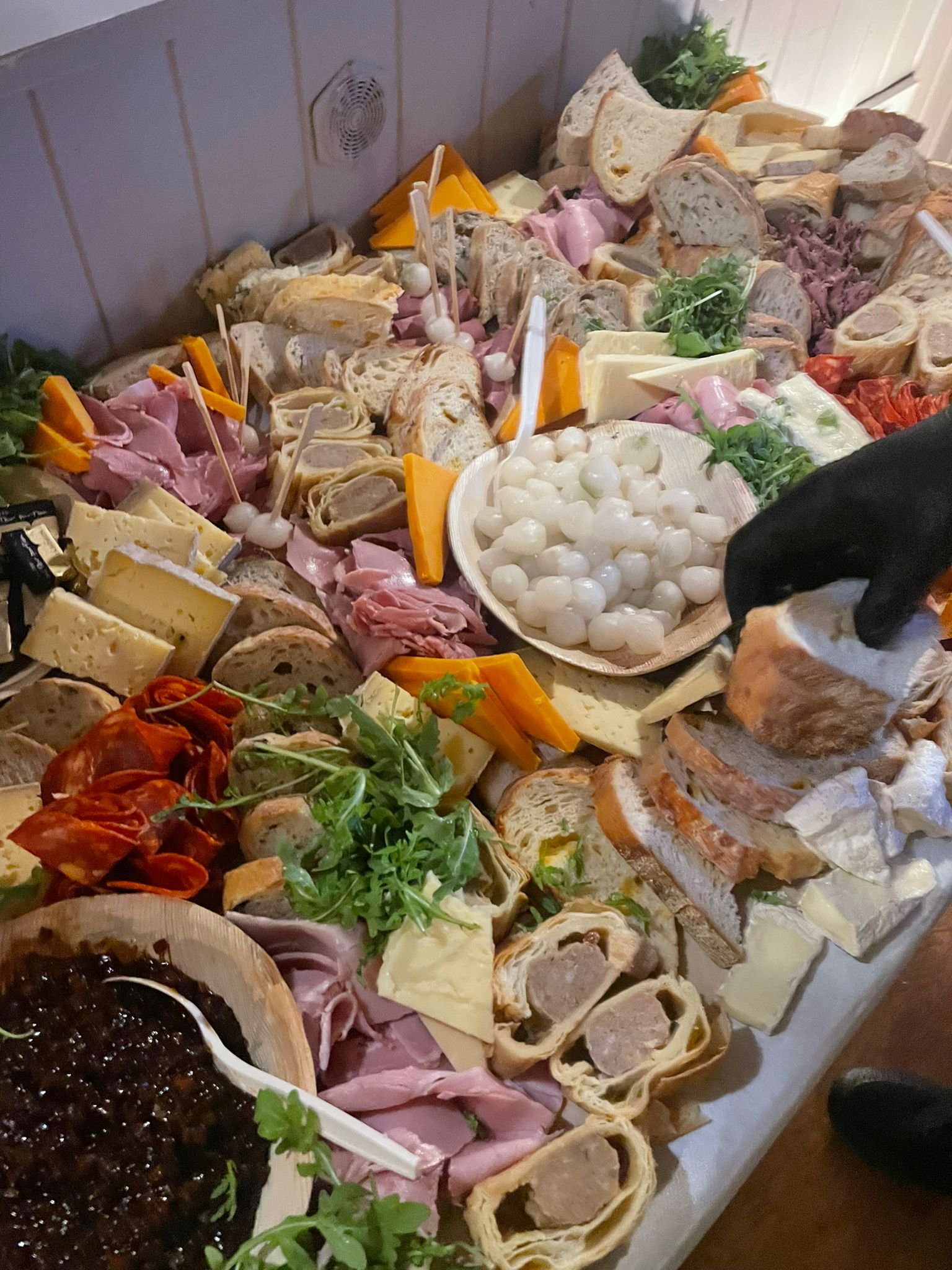 Chef setting up grazing table